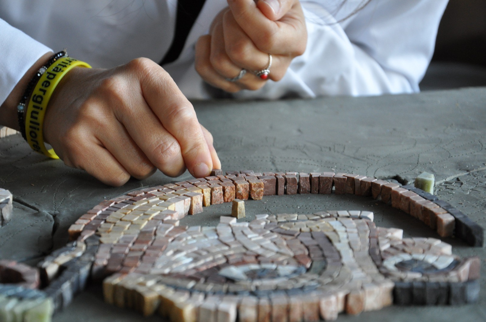 Artisan creating the Hotel Amalfi entrance mosaic